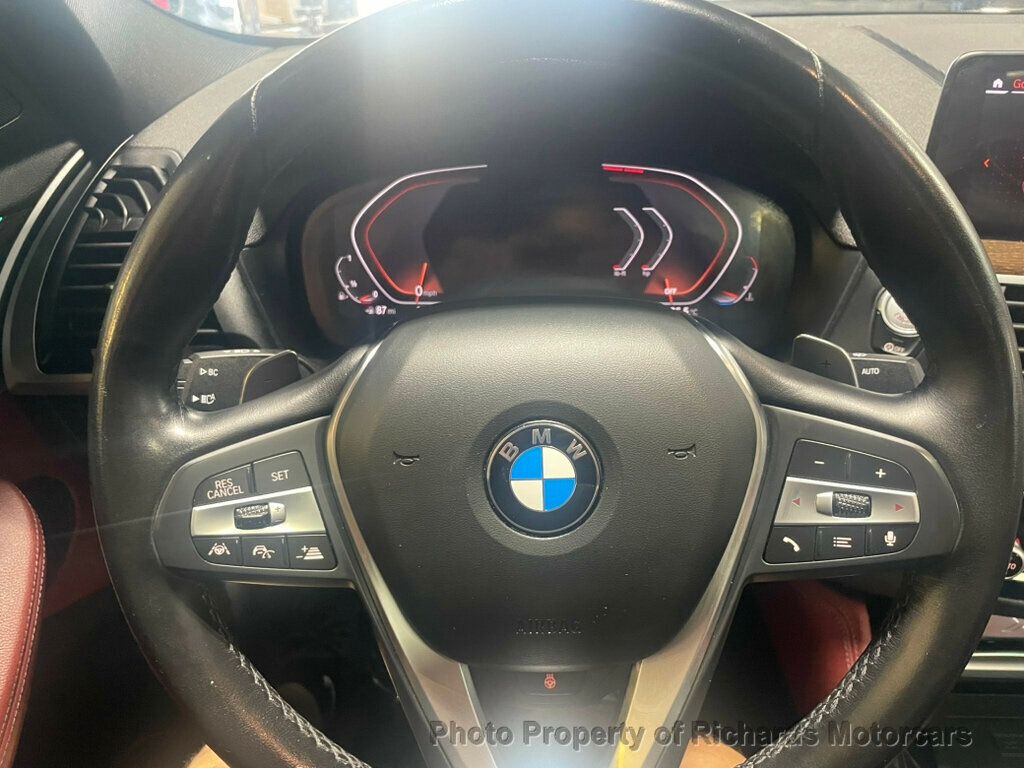 2020 BMW X4 xDrive30i Sports Activity - Black Sapphire Metallic exterior view 11