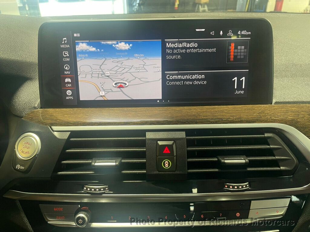 2020 BMW X4 xDrive30i Sports Activity - Black Sapphire Metallic exterior view 12