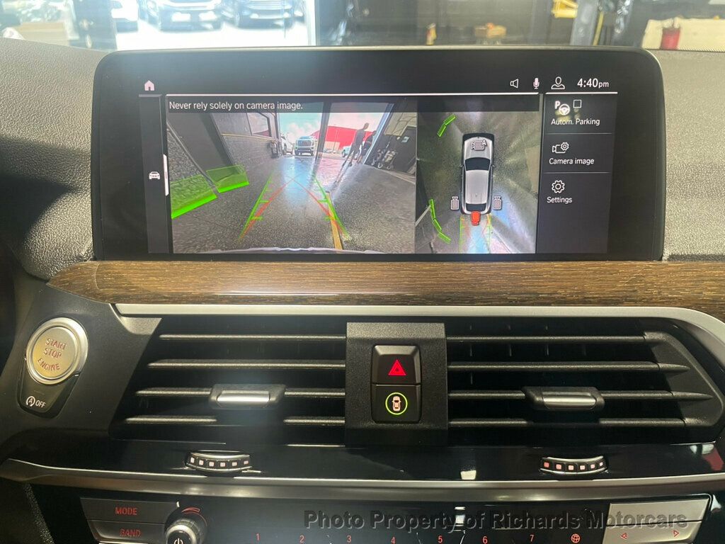 2020 BMW X4 xDrive30i Sports Activity - Black Sapphire Metallic exterior view 13