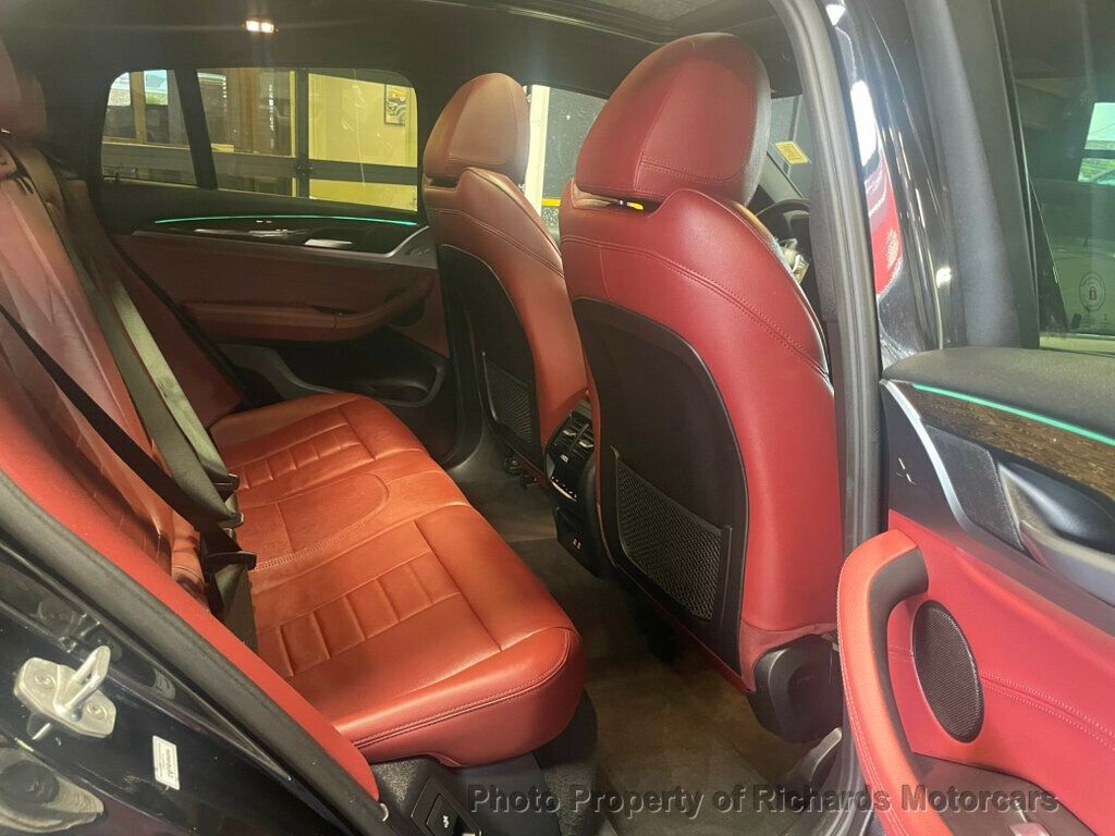 2020 BMW X4 xDrive30i Sports Activity - Black Sapphire Metallic exterior view 17