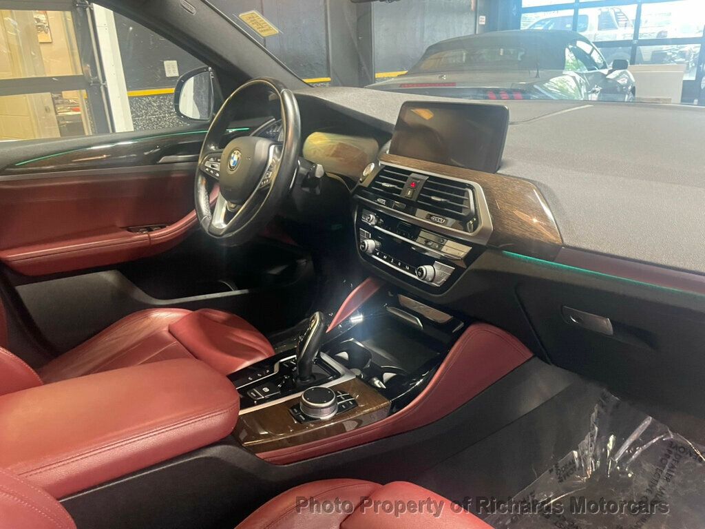 2020 BMW X4 xDrive30i Sports Activity - Black Sapphire Metallic exterior view 20