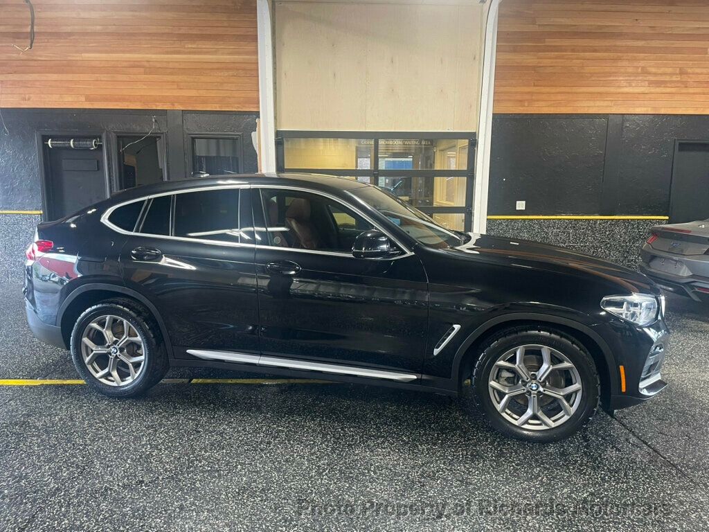 2020 BMW X4 xDrive30i Sports Activity - Black Sapphire Metallic exterior view 2