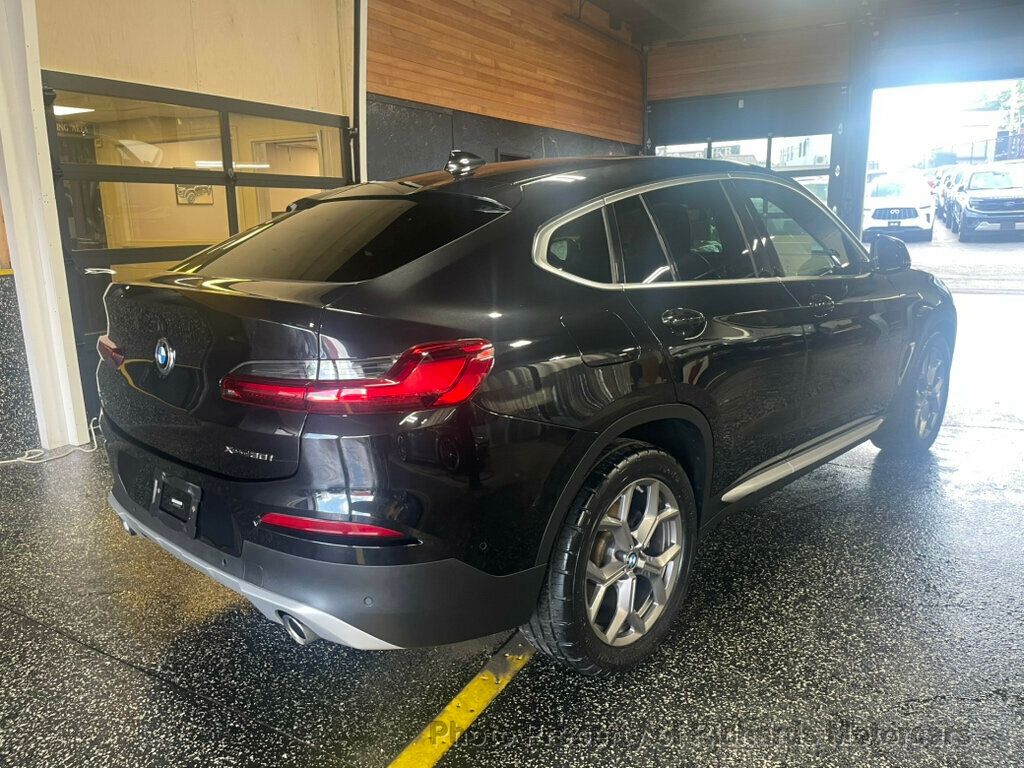 2020 BMW X4 xDrive30i Sports Activity - Black Sapphire Metallic exterior view 3