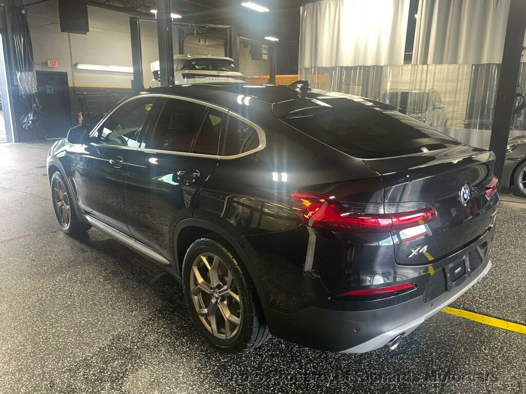 2020 BMW X4 xDrive30i Sports Activity - Black Sapphire Metallic exterior view 4