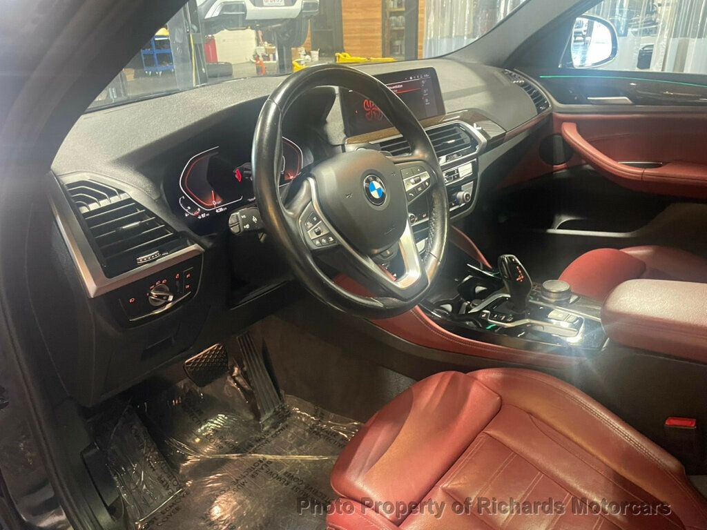 2020 BMW X4 xDrive30i Sports Activity - Black Sapphire Metallic exterior view 9