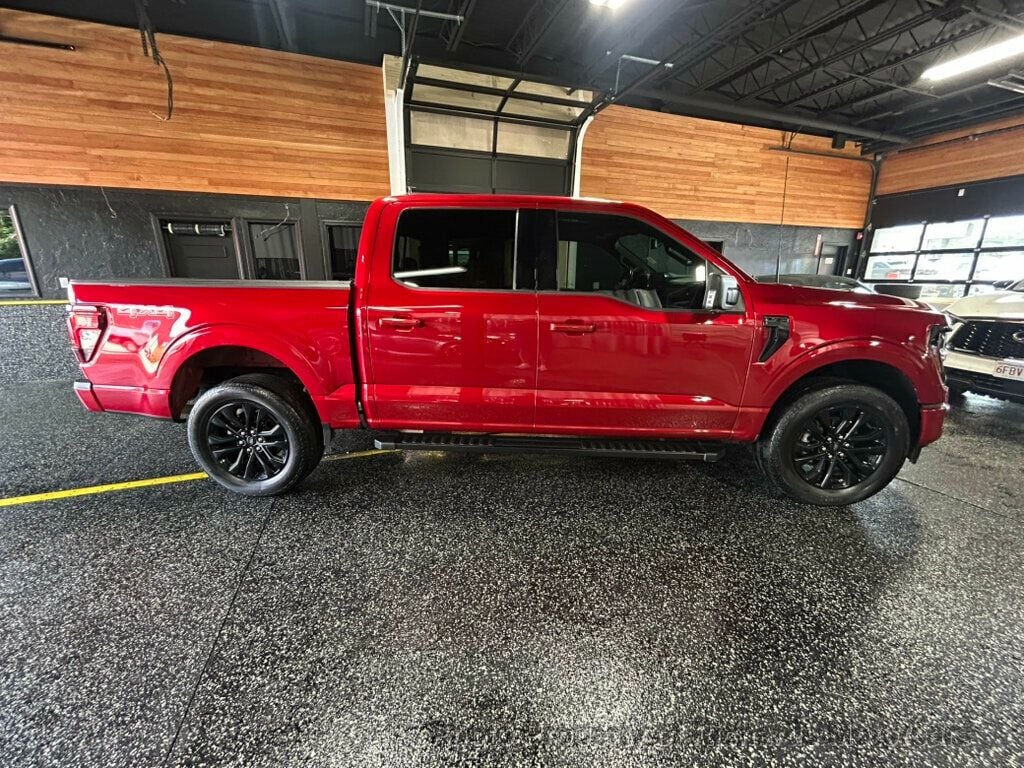 2024 Ford F-150 XLT 4WD SuperCrew 5.5' Box - Rapid Red Metallic Tinted Clearcoat exterior view 2