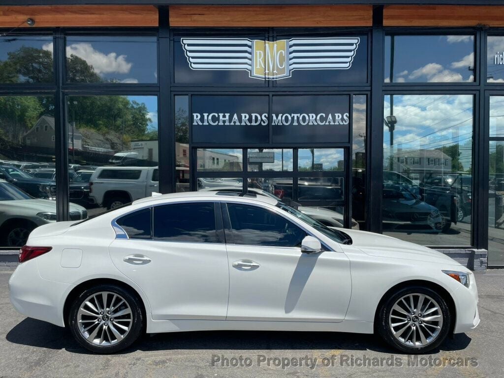 2023 INFINITI Q50 LUXE AWD - Majestic White exterior view 2