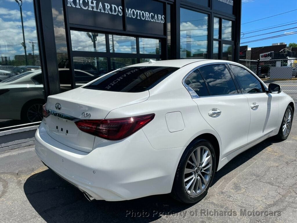 2023 INFINITI Q50 LUXE AWD - Majestic White exterior view 3