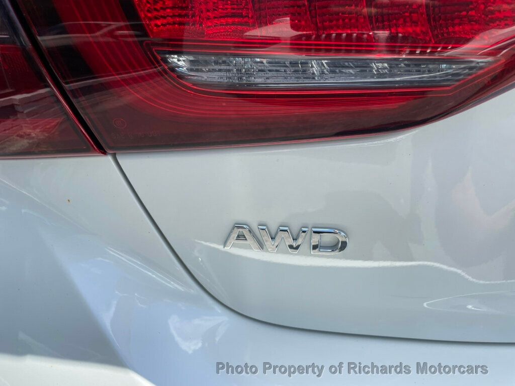 2023 INFINITI Q50 LUXE AWD - Majestic White exterior view 9