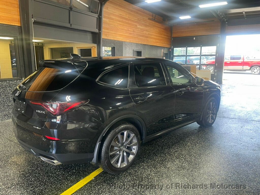 2023 Acura MDX SH-AWD w/A-Spec Package - Majestic Black Pearl exterior view 2