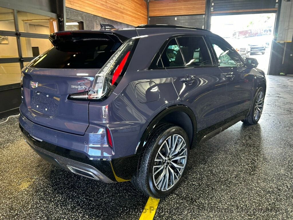 2024 Cadillac XT4 AWD 4dr Sport - Midnight Sky Metallic exterior view 3