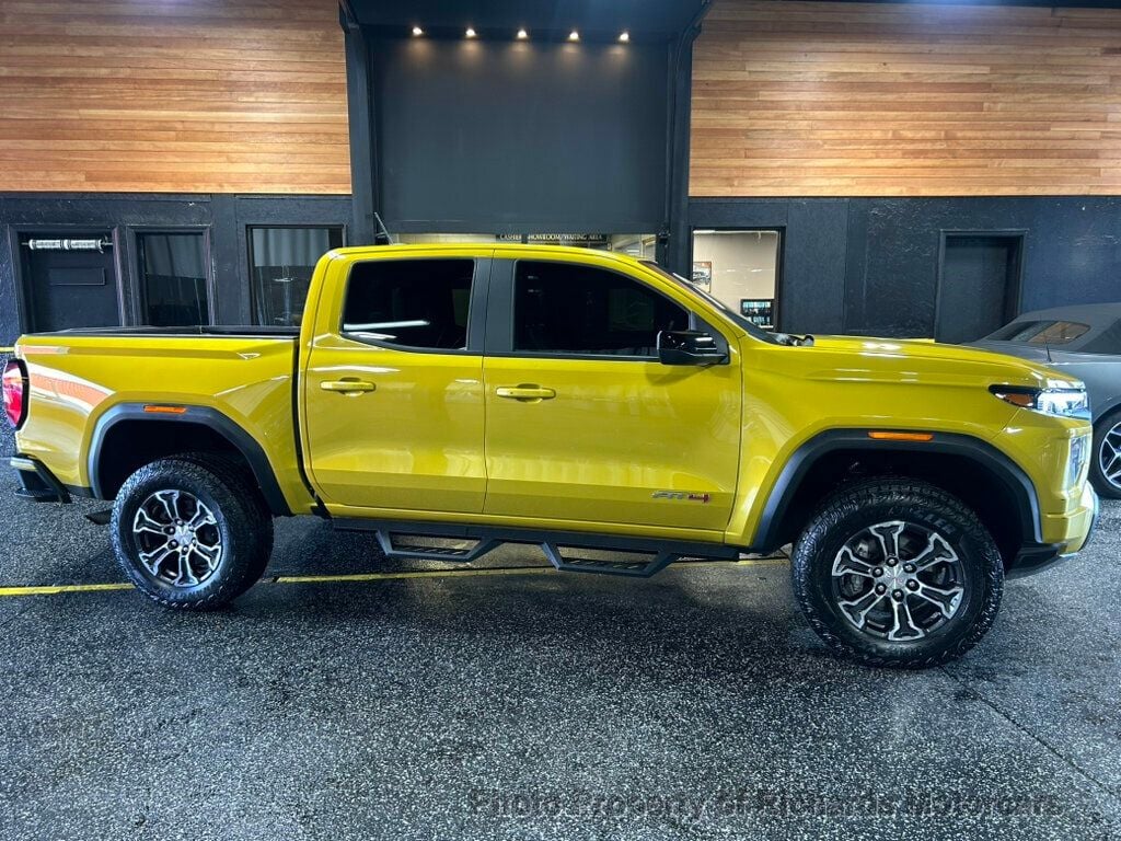 2024 GMC Canyon 4WD Crew Cab AT4 - Deep Bronze Metallic exterior view 2