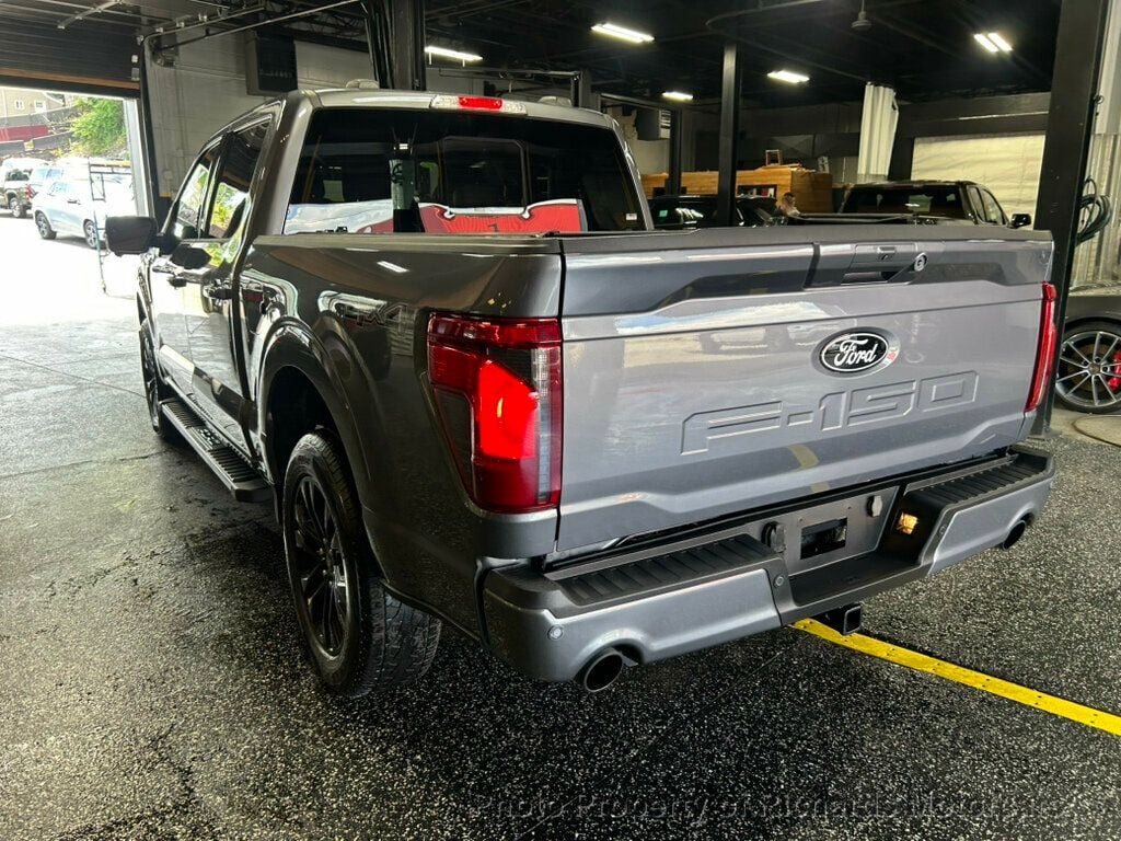 2024 Ford F-150 XLT 4WD SuperCrew 5.5' Box - Carbonized Gray Metallic exterior view 4