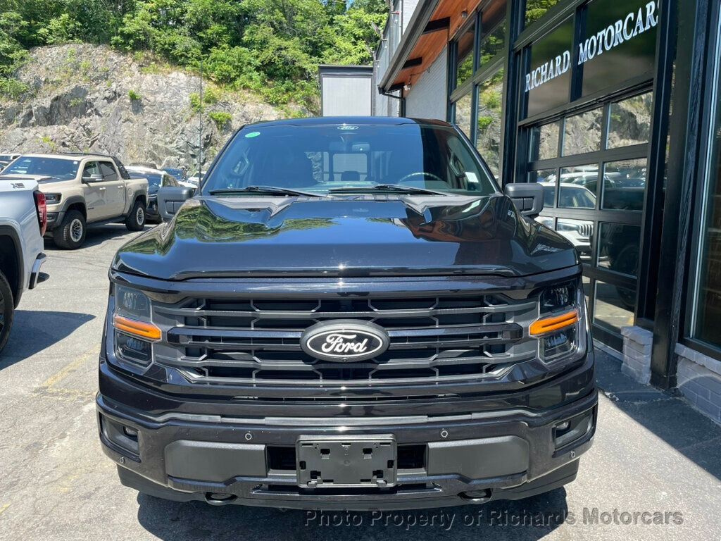2024 Ford F-150 XLT 4WD SuperCrew 5.5' Box - Agate Black Metallic exterior view 3