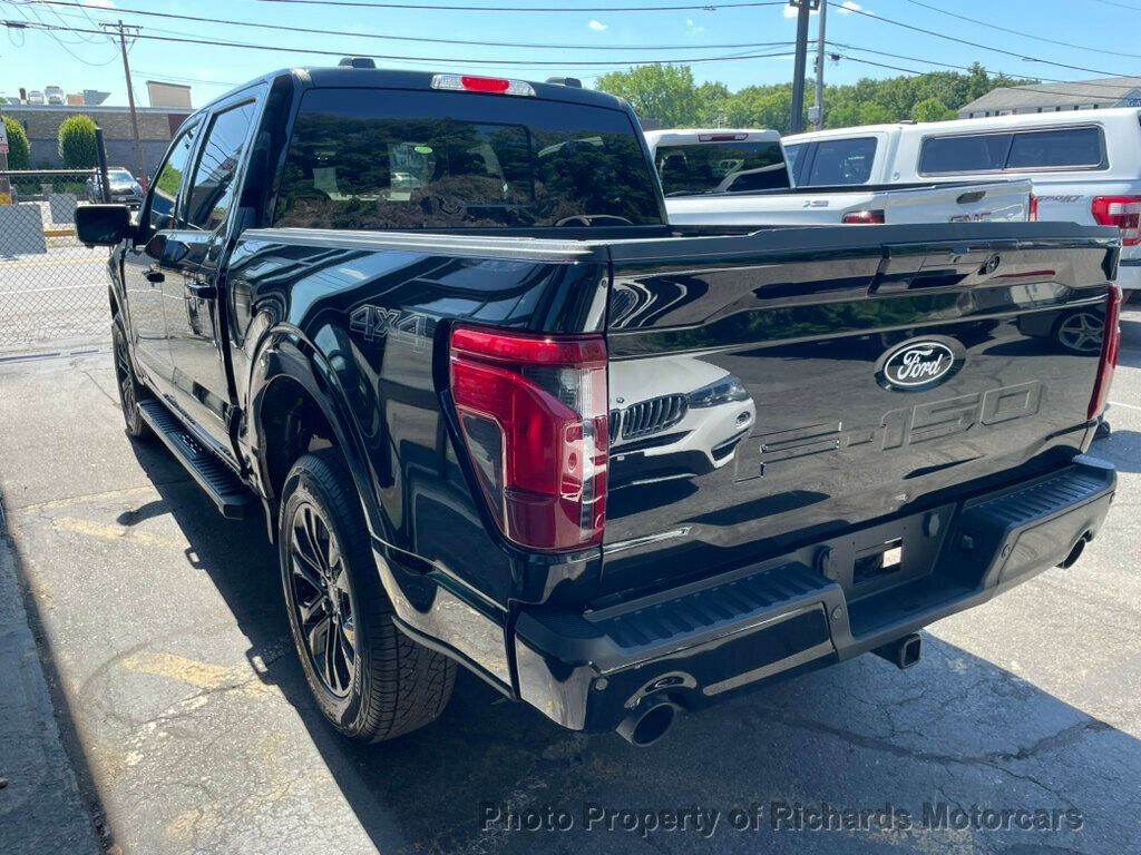 2024 Ford F-150 XLT 4WD SuperCrew 5.5' Box - Agate Black Metallic exterior view 5