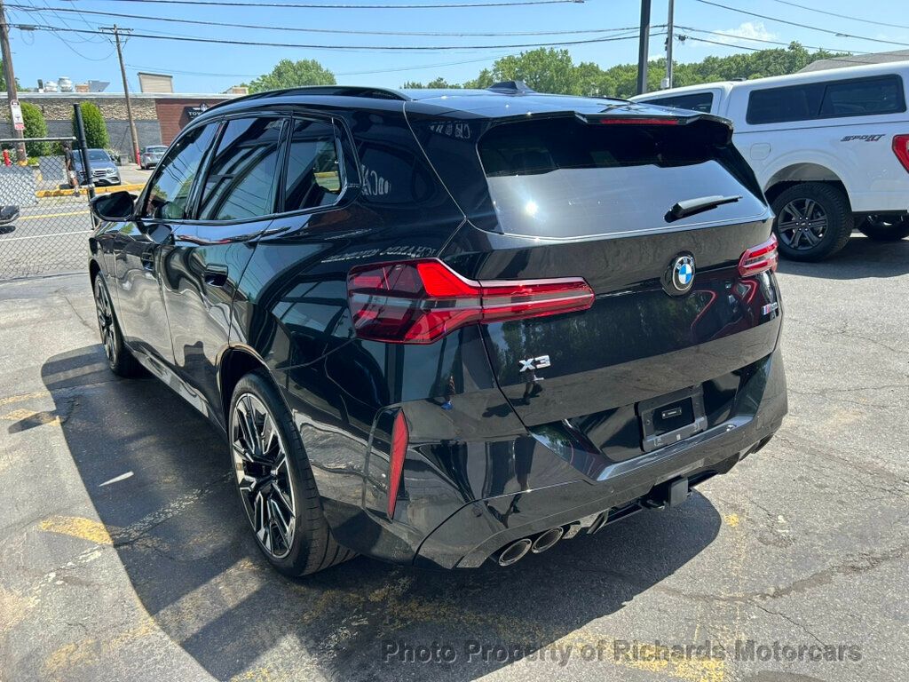 2025 BMW X3 M50 xDrive Sports Activity Vehicle - Black Sapphire Metallic exterior view 4