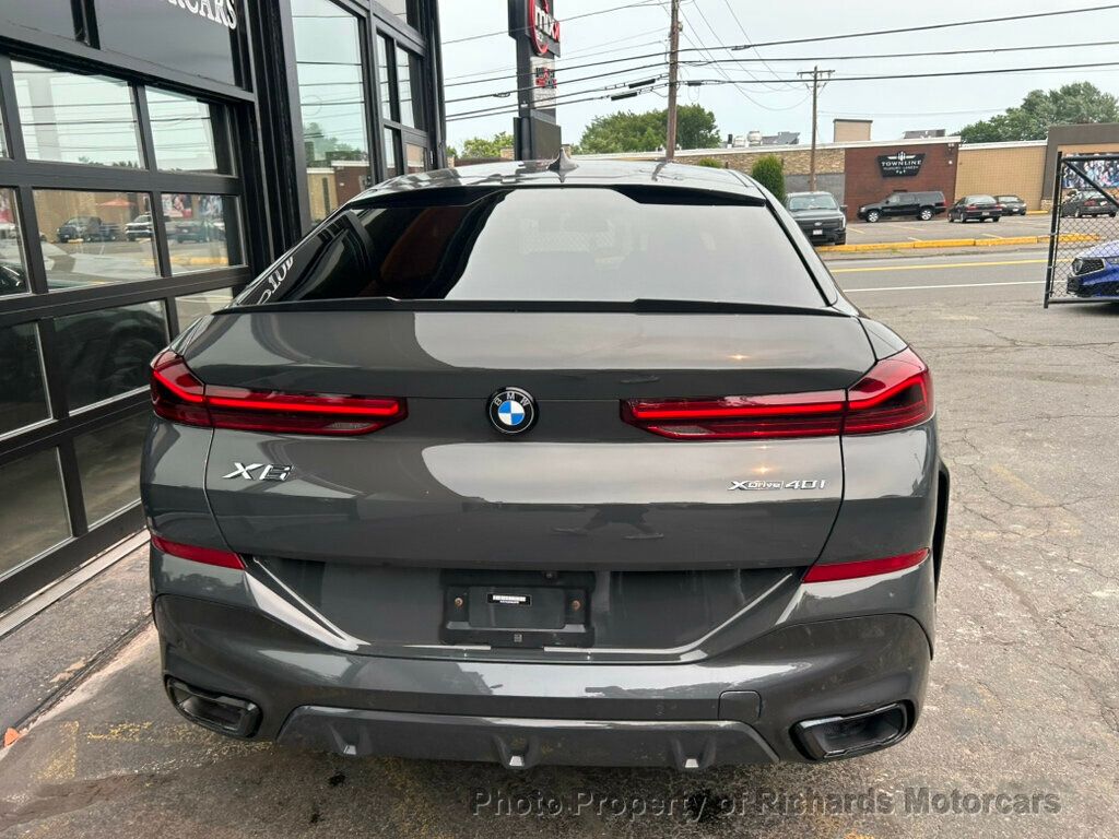 2022 BMW X6 xDrive40i Sports Activity - Dravit Grey Metallic exterior view 3