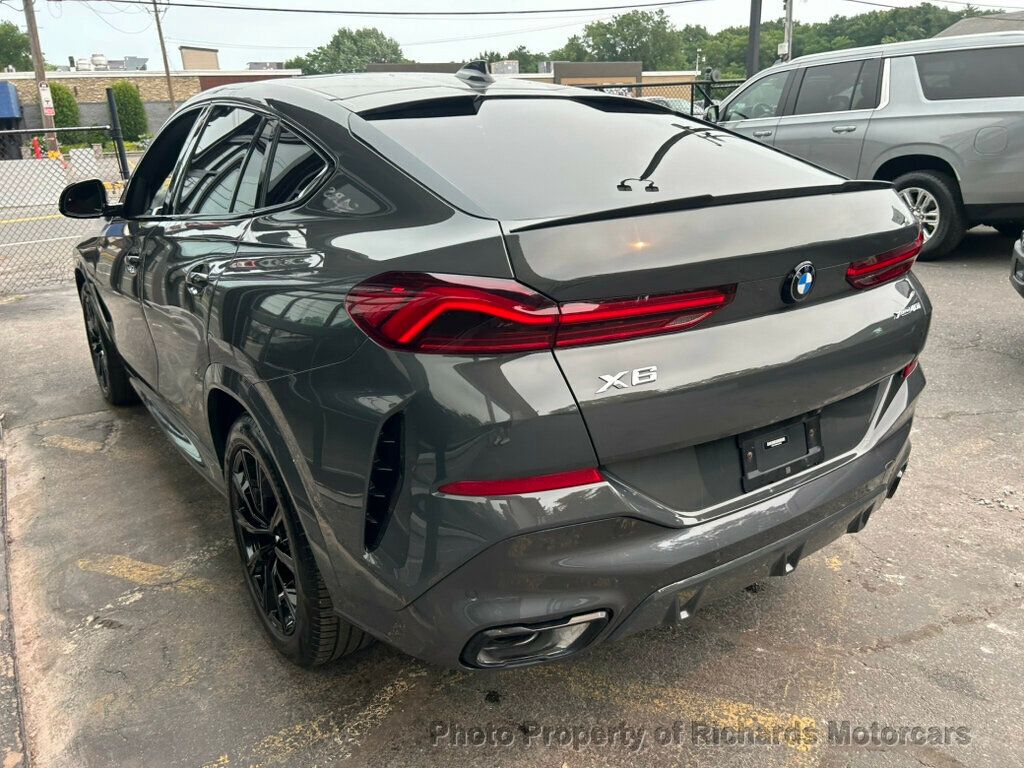 2022 BMW X6 xDrive40i Sports Activity - Dravit Grey Metallic exterior view 4