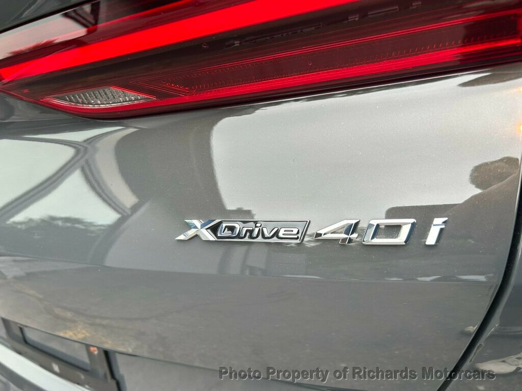 2022 BMW X6 xDrive40i Sports Activity - Dravit Grey Metallic exterior view 9