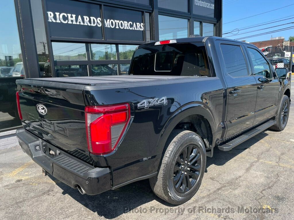 2024 Ford F-150 XLT 4WD SuperCrew 5.5' Box - Agate Black Metallic exterior view 3