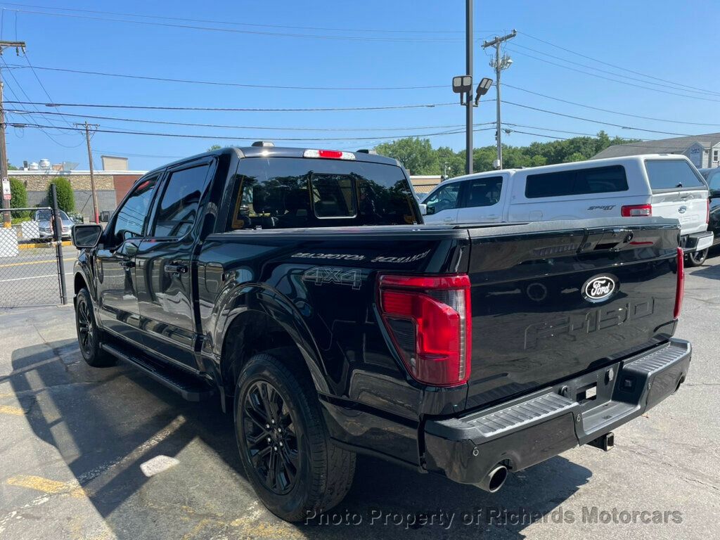 2024 Ford F-150 XLT 4WD SuperCrew 5.5' Box - Agate Black Metallic exterior view 6