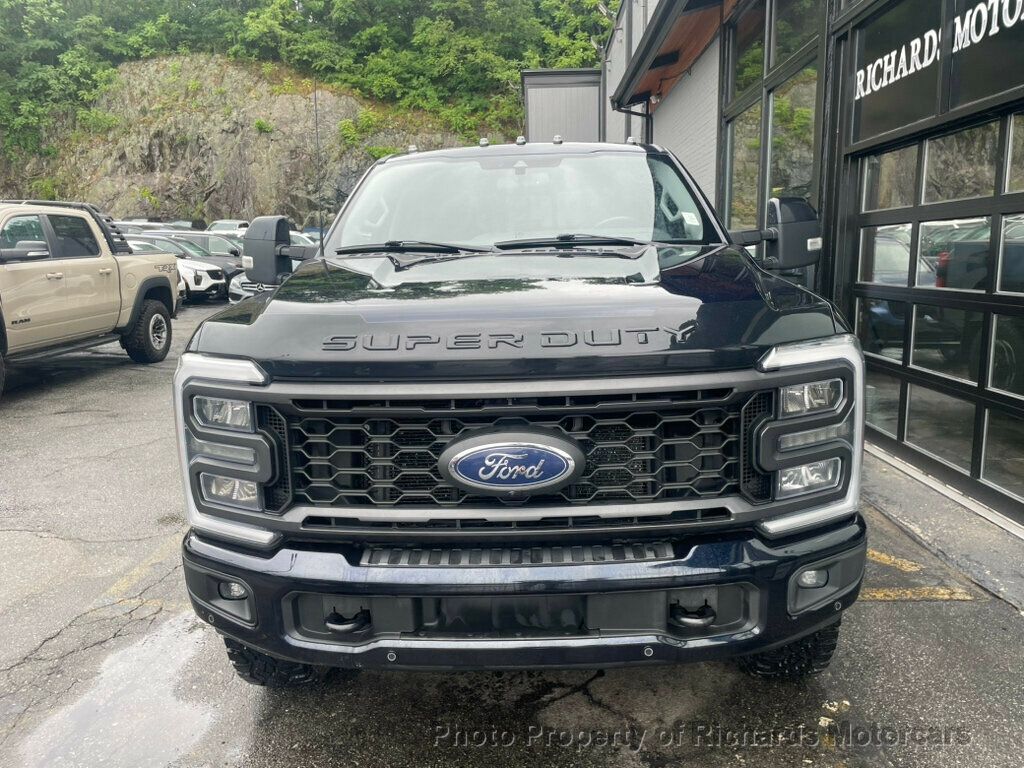 2023 Ford Super Duty F-250 SRW LARIAT 4WD Crew Cab 6.75' Box - Antimatter Blue Metallic exterior view 4