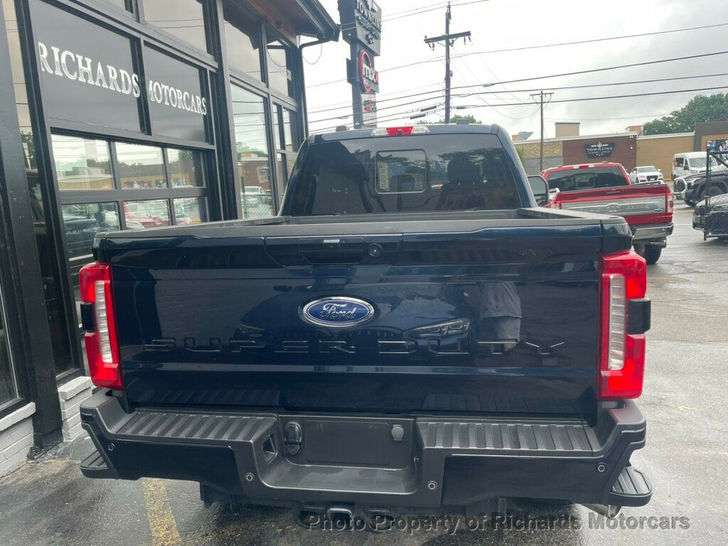 2023 Ford Super Duty F-250 SRW LARIAT 4WD Crew Cab 6.75' Box - Antimatter Blue Metallic exterior view 7