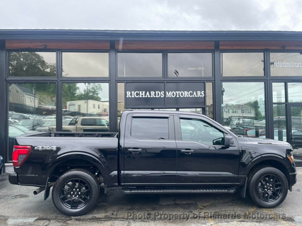 2024 Ford F-150 STX 4WD SuperCrew 5.5' Box - Agate Black Metallic exterior view 2