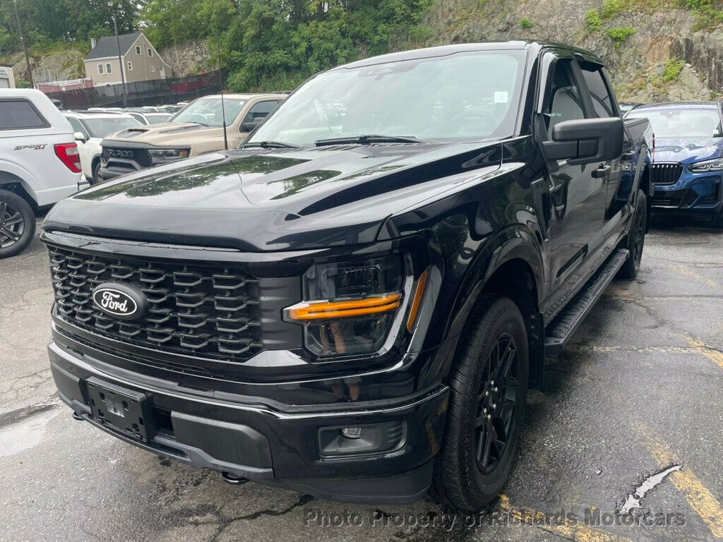 2024 Ford F-150 STX 4WD SuperCrew 5.5' Box - Agate Black Metallic exterior view 5