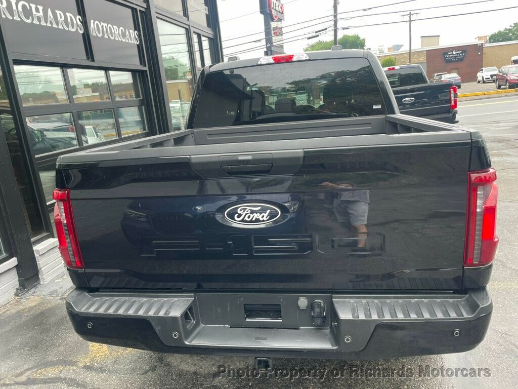 2024 Ford F-150 STX 4WD SuperCrew 5.5' Box - Agate Black Metallic exterior view 7
