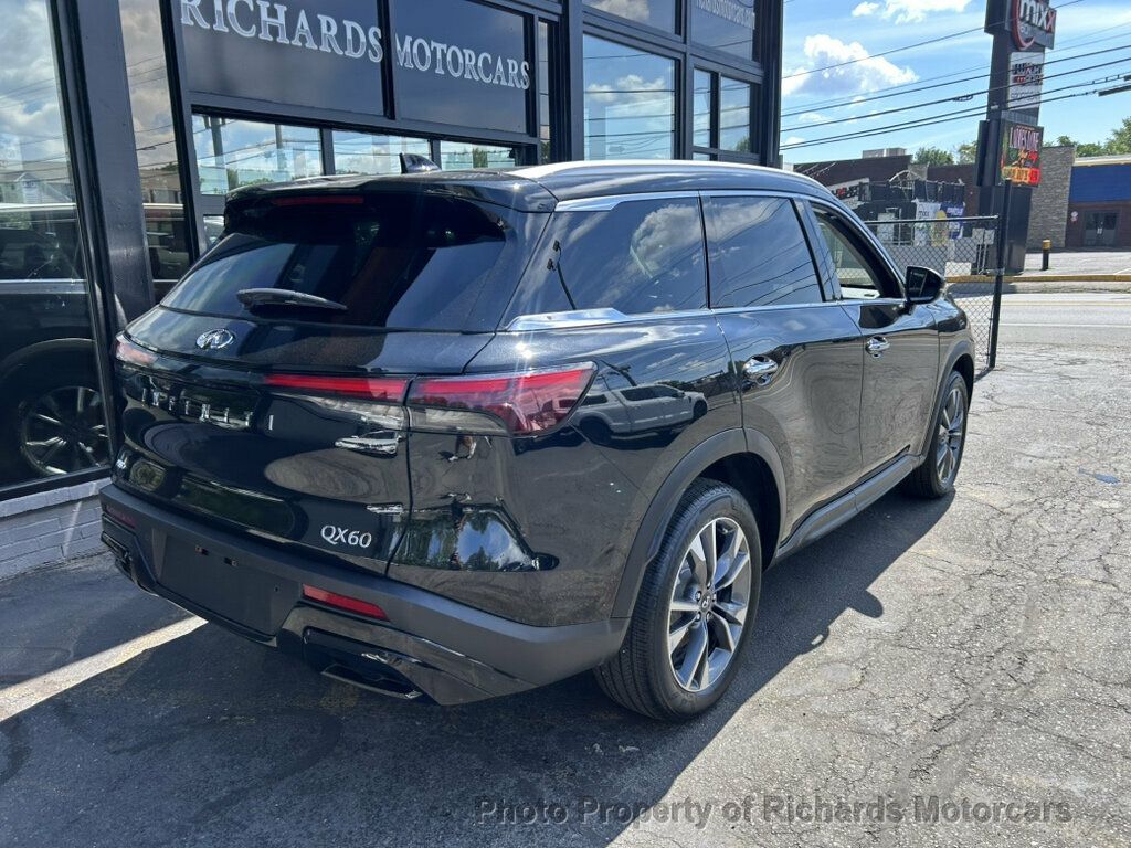 2024 INFINITI QX60 LUXE AWD - Mineral Black exterior view 2