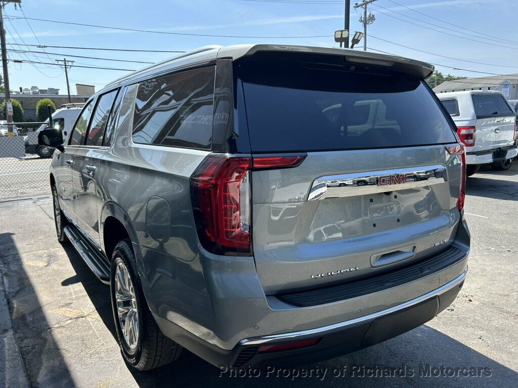 2024 GMC Yukon XL 4WD 4dr SLT - Sterling Metallic exterior view 4