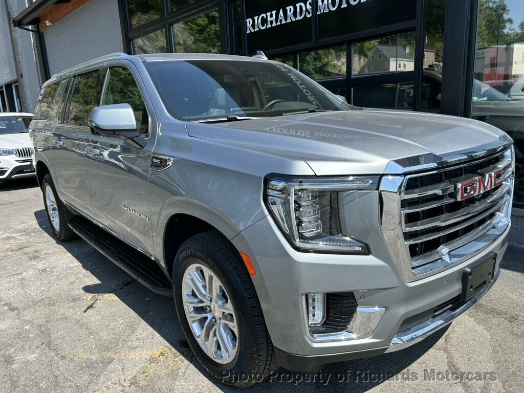 2024 GMC Yukon XL 4WD 4dr SLT - Sterling Metallic exterior view 7
