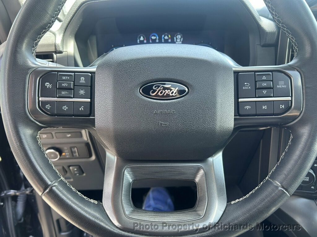 2024 Ford F-150 XLT 4WD SuperCrew 5.5' Box - Atlas Blue Metallic exterior view 14