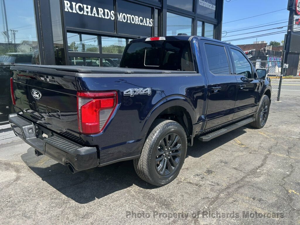2024 Ford F-150 XLT 4WD SuperCrew 5.5' Box - Atlas Blue Metallic exterior view 2