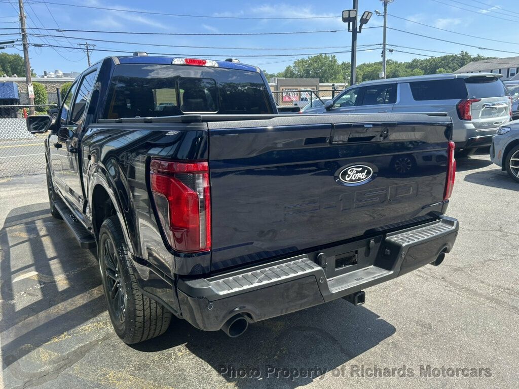 2024 Ford F-150 XLT 4WD SuperCrew 5.5' Box - Atlas Blue Metallic exterior view 4