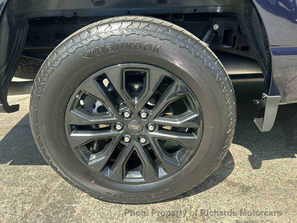2024 Ford F-150 XLT 4WD SuperCrew 5.5' Box - Atlas Blue Metallic exterior view 9