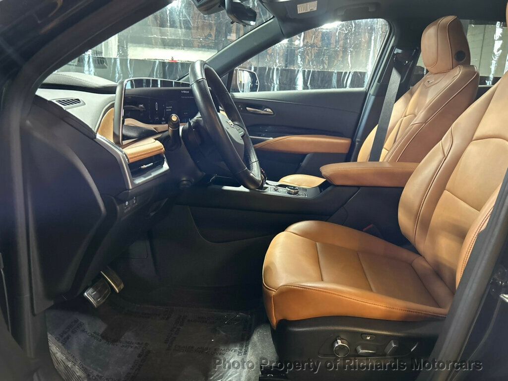 2024 Cadillac XT4 AWD 4dr Sport - Stellar Black Metallic exterior view 12