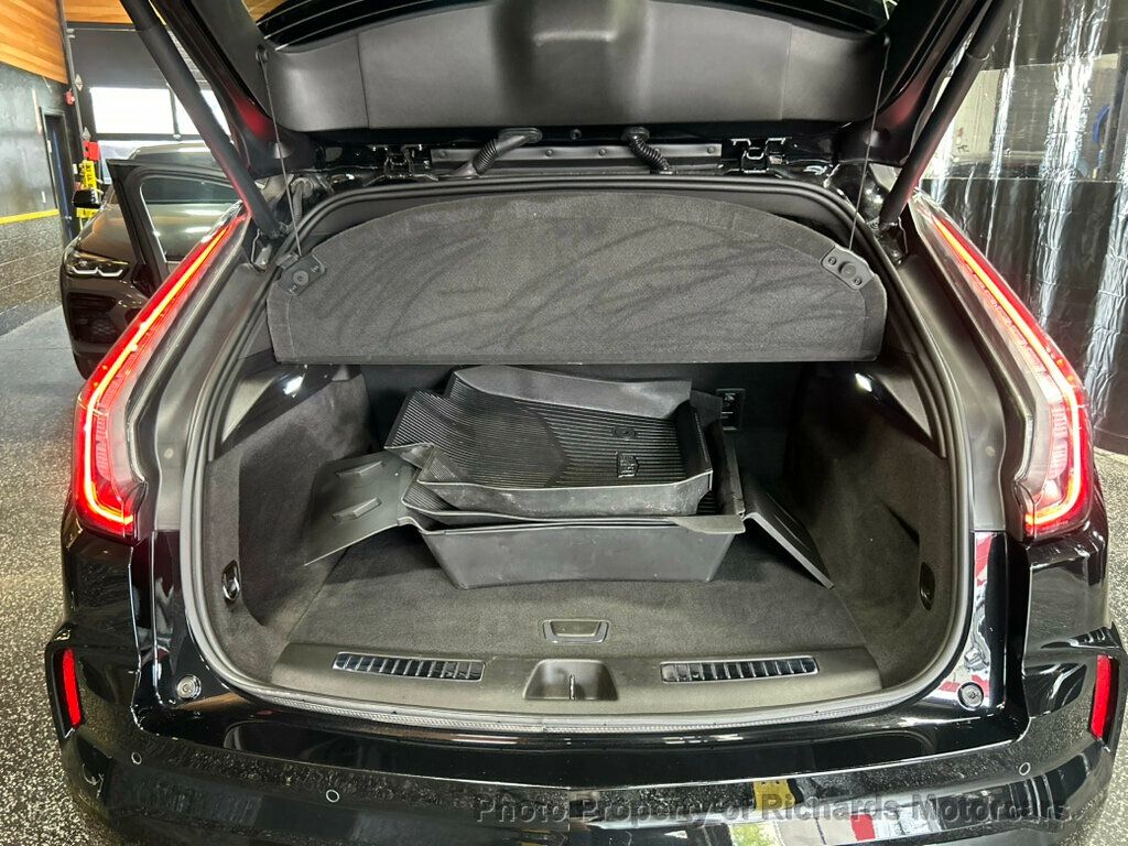 2024 Cadillac XT4 AWD 4dr Sport - Stellar Black Metallic exterior view 19