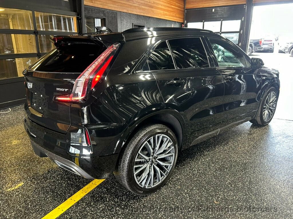 2024 Cadillac XT4 AWD 4dr Sport - Stellar Black Metallic exterior view 2