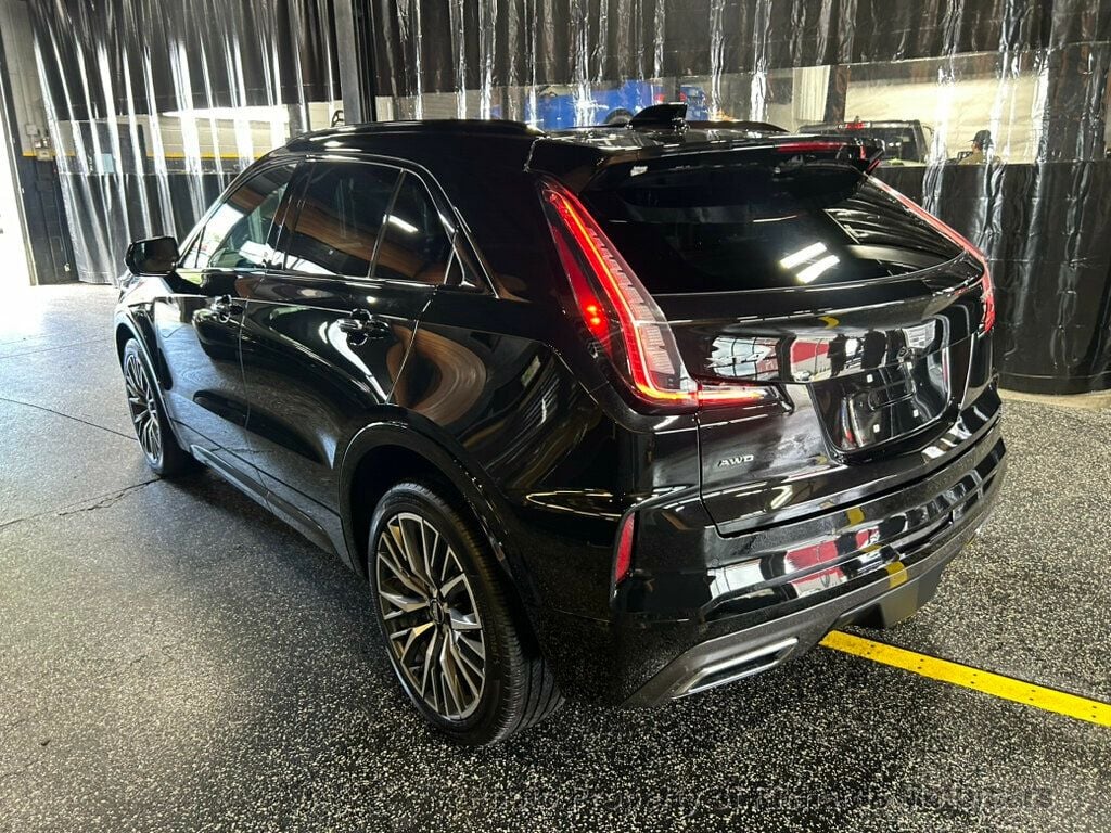 2024 Cadillac XT4 AWD 4dr Sport - Stellar Black Metallic exterior view 4