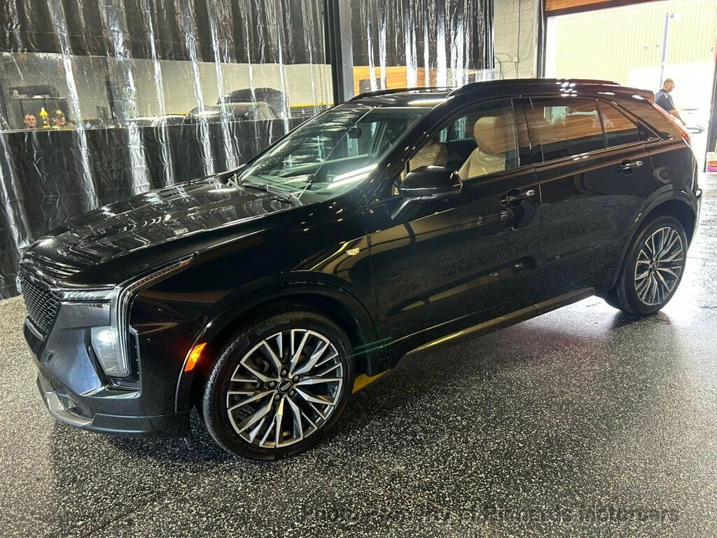 2024 Cadillac XT4 AWD 4dr Sport - Stellar Black Metallic exterior view 5