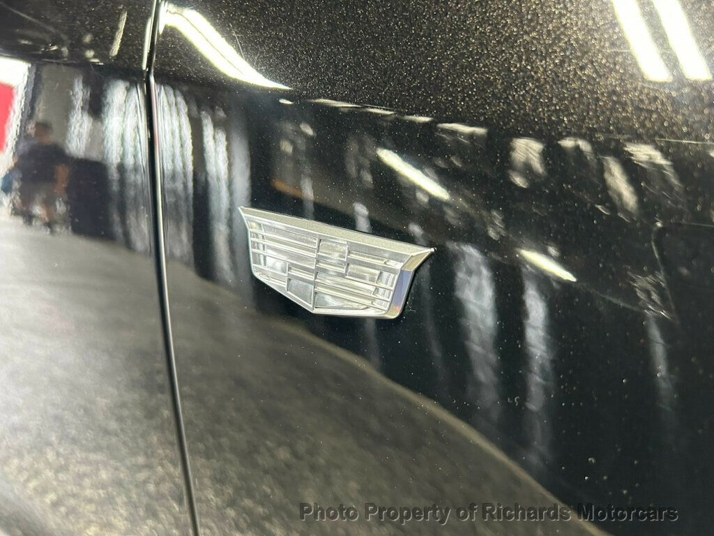 2024 Cadillac XT4 AWD 4dr Sport - Stellar Black Metallic exterior view 8