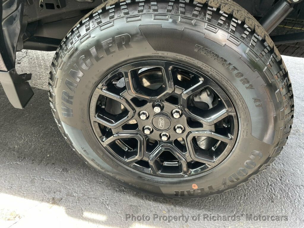 2024 Ford F-150 XLT 4WD SuperCrew 5.5' Box - Antimatter Blue Metallic exterior view 10