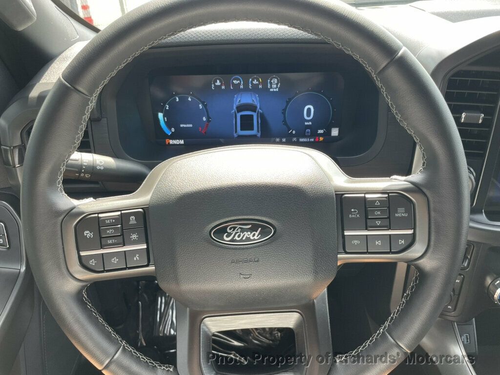 2024 Ford F-150 XLT 4WD SuperCrew 5.5' Box - Antimatter Blue Metallic exterior view 15