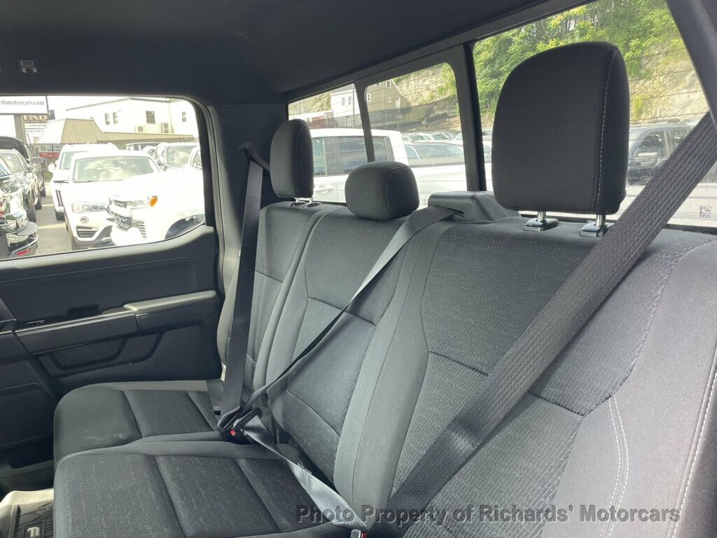 2024 Ford F-150 XLT 4WD SuperCrew 5.5' Box - Antimatter Blue Metallic exterior view 19