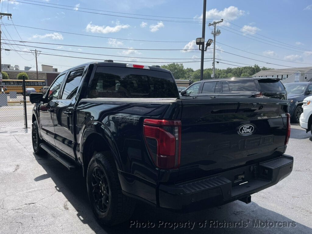 2024 Ford F-150 XLT 4WD SuperCrew 5.5' Box - Antimatter Blue Metallic exterior view 6