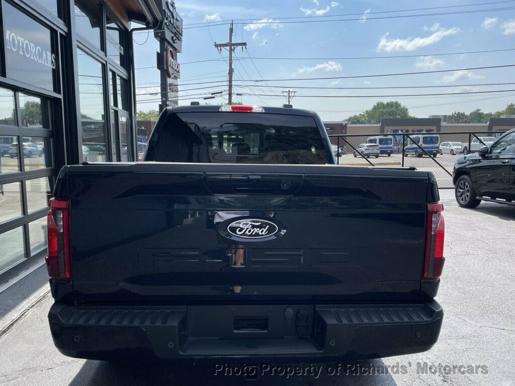 2024 Ford F-150 XLT 4WD SuperCrew 5.5' Box - Antimatter Blue Metallic exterior view 7