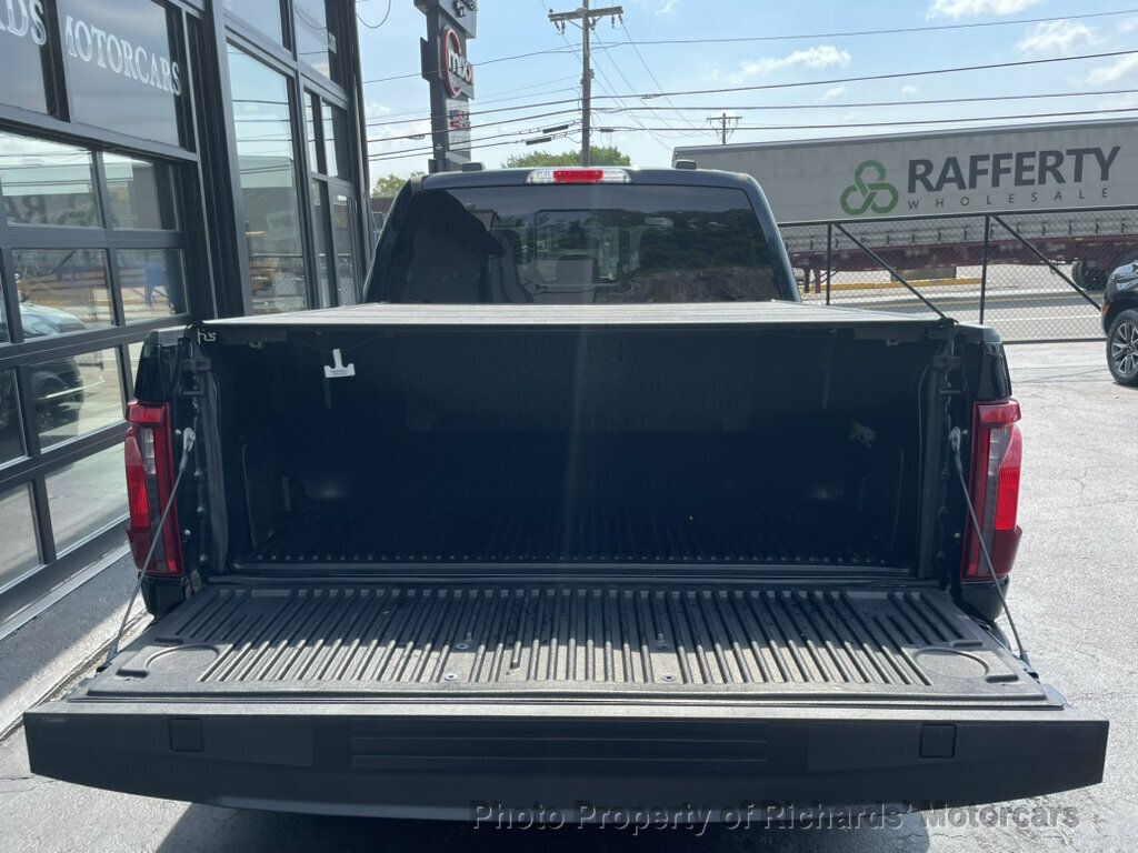 2024 Ford F-150 XLT 4WD SuperCrew 5.5' Box - Antimatter Blue Metallic exterior view 8