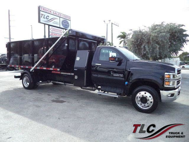 https://cdn.ebizautos.media/new-2023-chevrolet-6500-14ftswitchngorollofftruckptowithcontainer-10340-22232912-1-640.jpg